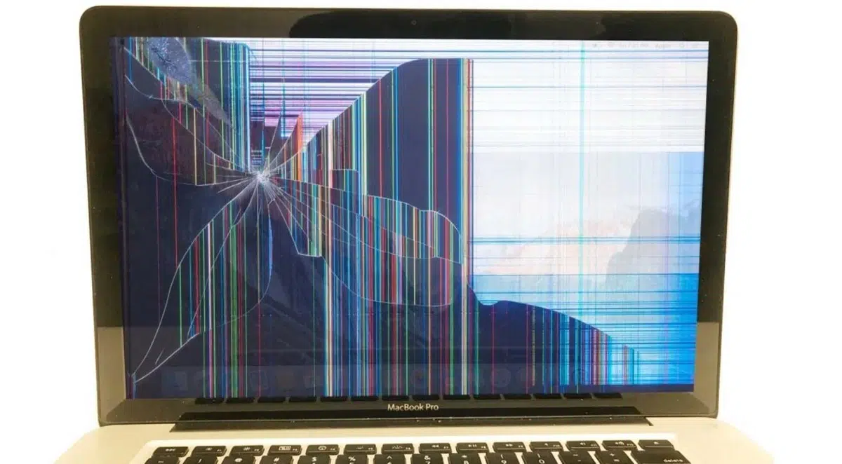 MacBook Pro mit zerbrochenem Display und Pixelfehlern